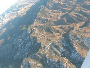 Snow in the shadows of the mountains between Phoenix and El Paso