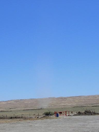 A dust devil (look for the tumbleweeds)