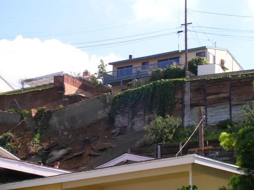 Eeek!  Hill half a block north of us comes down in the rain (Jan 2005)